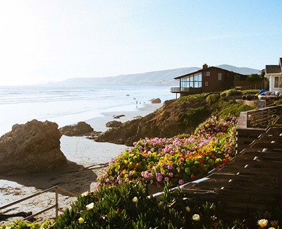 Photo of beach scene with hosues