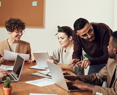 coworkers reviewing in a meeting