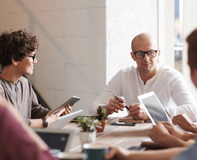 Coworkers in meetings
