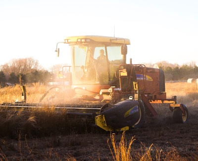 Tractor plowing field