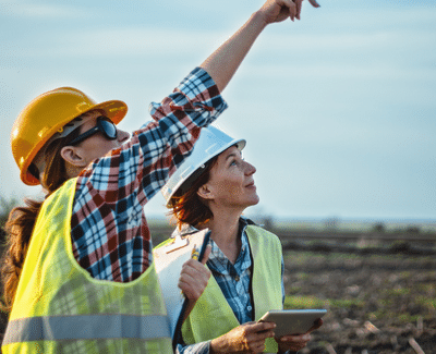 Construction workers looking at site