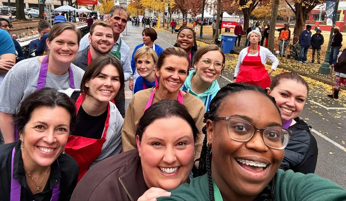 Oakbridge in aprons at road running race