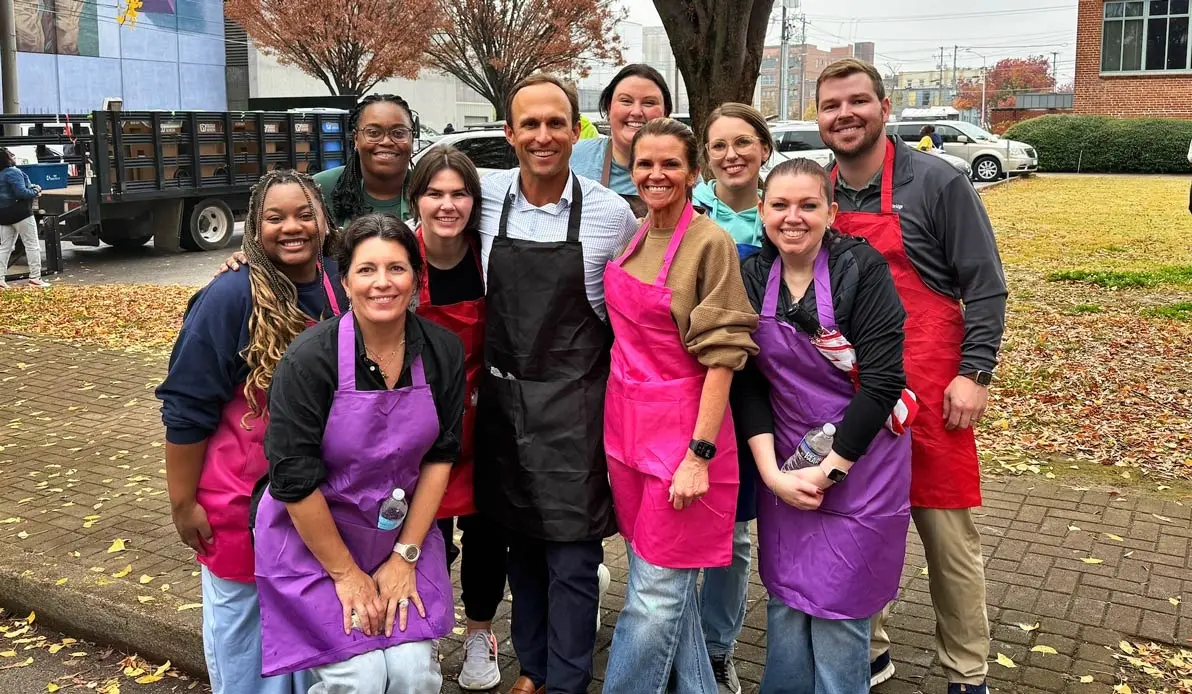 Oakbridge in aprons at road running race